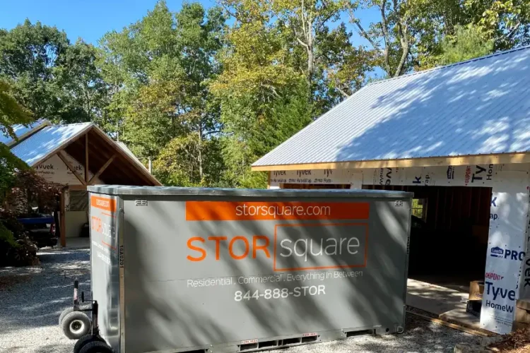 Storage containers for home renovation outside a house during remodeling