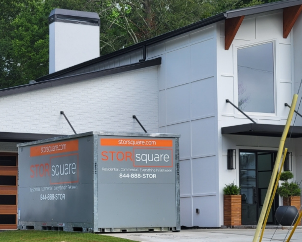 STORsquare portable storage containers placed outside a home during a move in Acworth, Georgia.