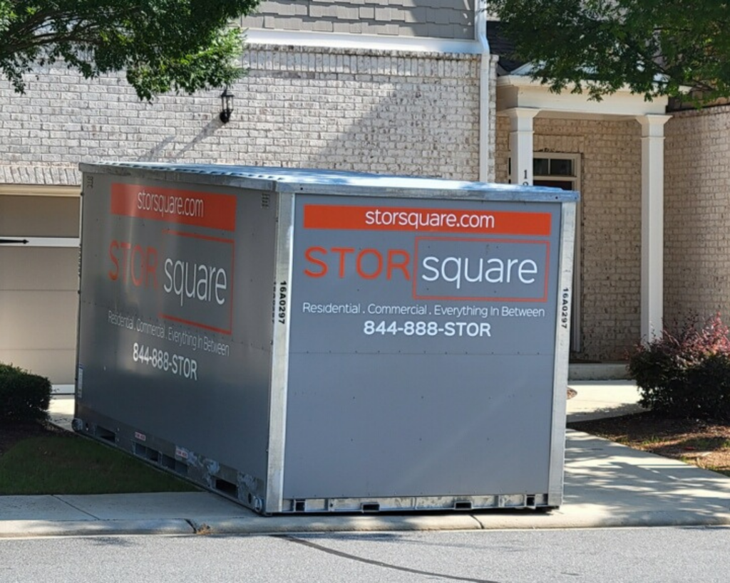 Portable storage container placed outside a North Carolina home, showing flexible rental options for moving and storage projects.