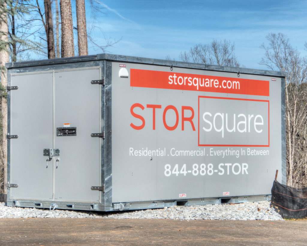 A STORsquare steel container on a gravel pad, highlighting the durability and reliability customers expect when comparing storage providers.