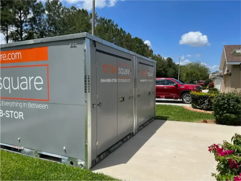 STORsquare long distance moving container placed in a residential driveway, showing portable storage flexibility for Central Florida moves.