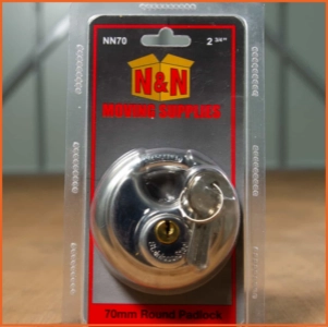 Heavy-duty disc lock padlock used to secure moving containers, designed to cover the shackle and prevent cutting.