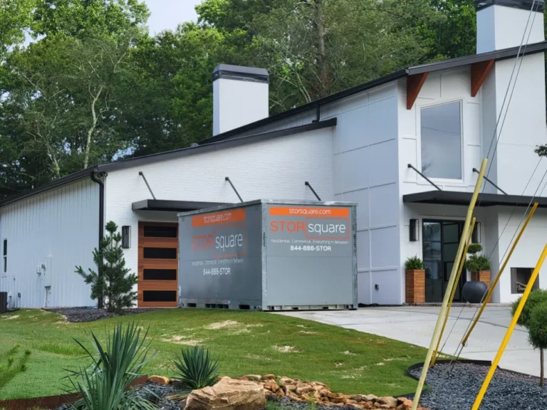 STORsquare moving container placed at a modern home, illustrating cost-effective residential moving container solutions.