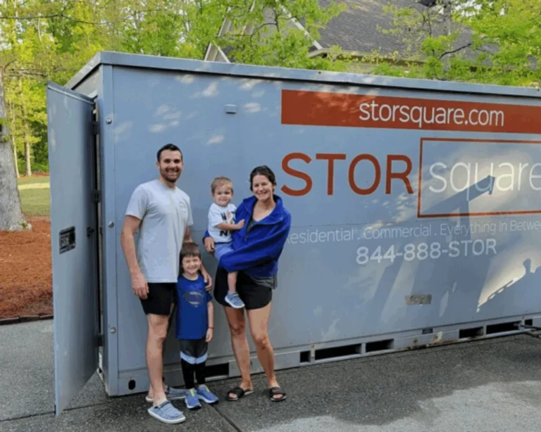 A family standing beside a STORsquare steel moving container in Georgia, reflecting five-star service, reliable delivery, and personalized local support.