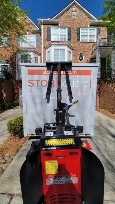 STORsquare portable storage container delivered with a no-tilt system in front of a residential townhouse in Knoxville, Tennessee.