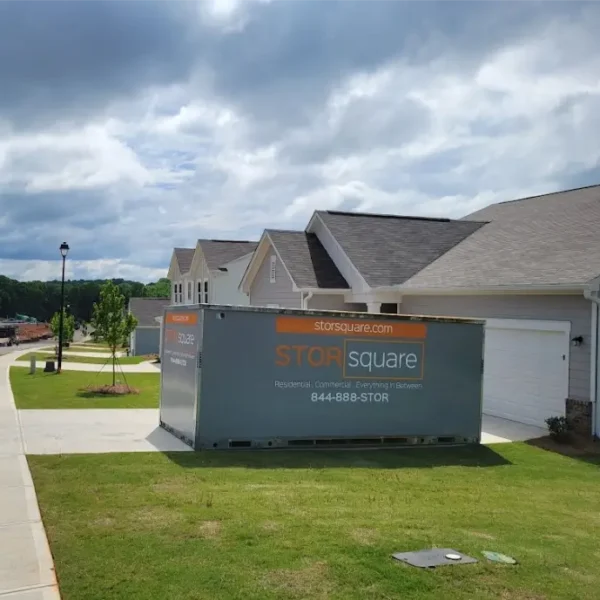 STORsquare portable storage container placed in a residential driveway in Alcoa, TN neighborhood during a home move.