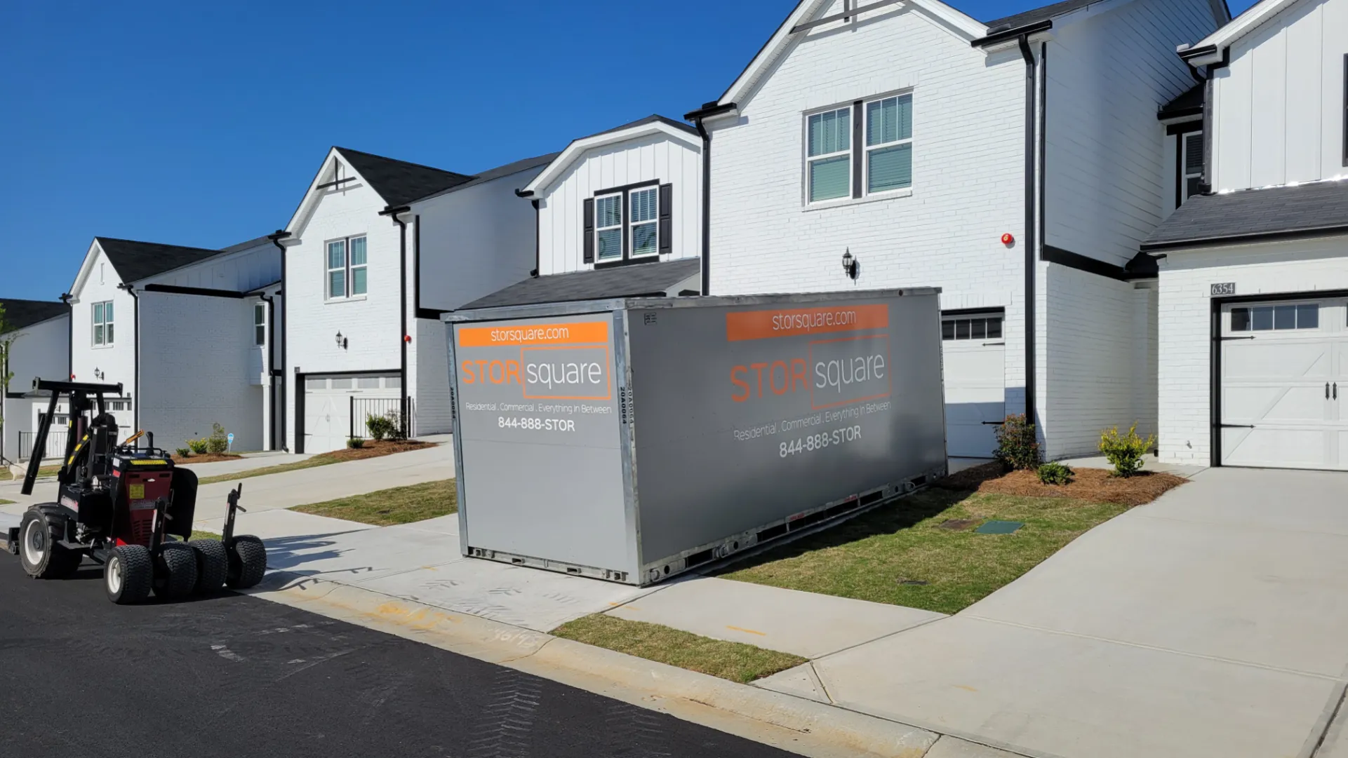 Portable storage unit delivered to a residential neighborhood, offering flexible storage during unexpected life changes.