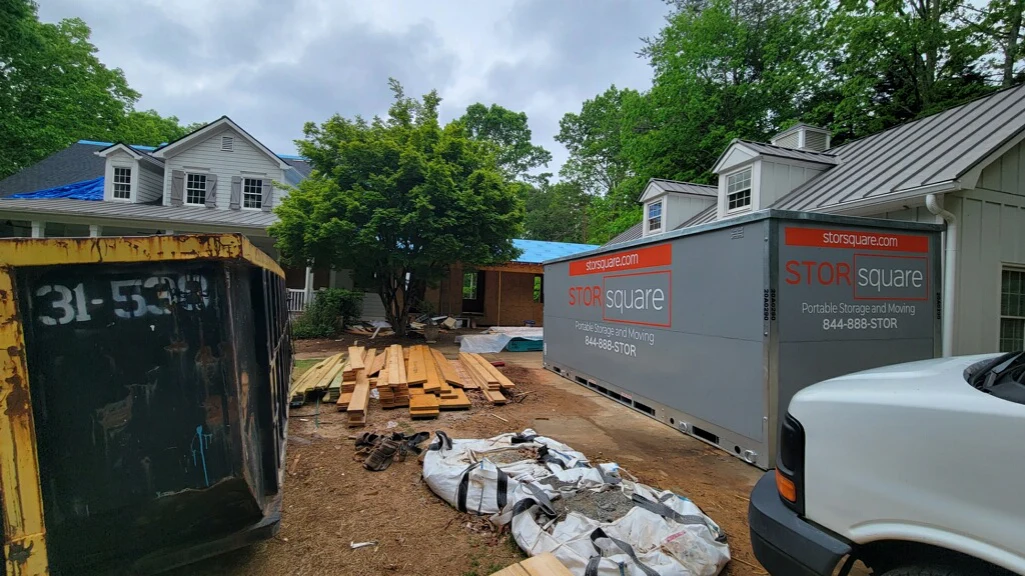 Portable storage container on a home remodel site showing how storage container rentals help renovations stay organized