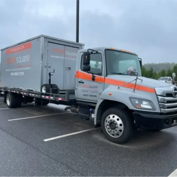 STORsquare moving container loaded on a flatbed truck in Acworth, GA.