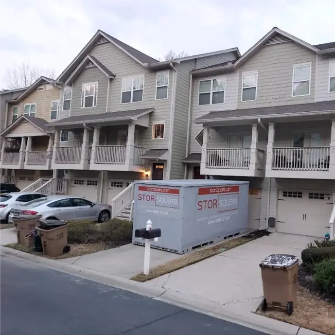 STORsquare moving container placed in front of a row of townhomes in Acworth, GA.