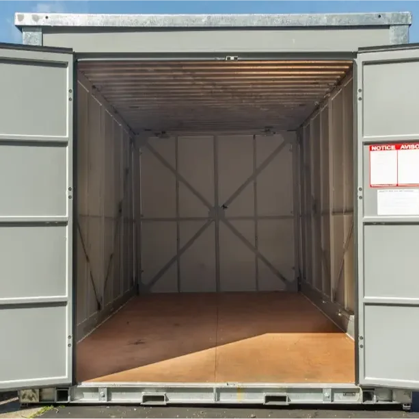 Interior view of an empty STORsquare portable storage container in Alcoa, TN with open double doors and clean wood flooring ready for loading.