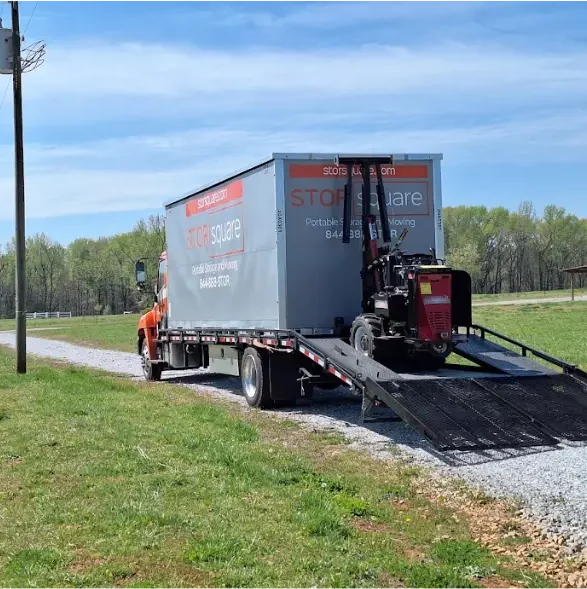 STORsquare portable storage container delivered with a no-tilt system along a rural South Carolina gravel road.
