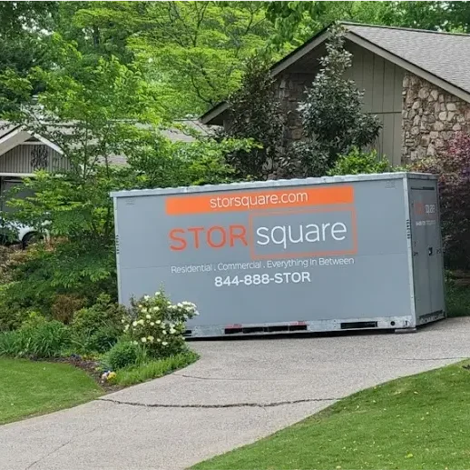 STORsquare portable storage unit positioned on a curved residential driveway in Acworth, GA.