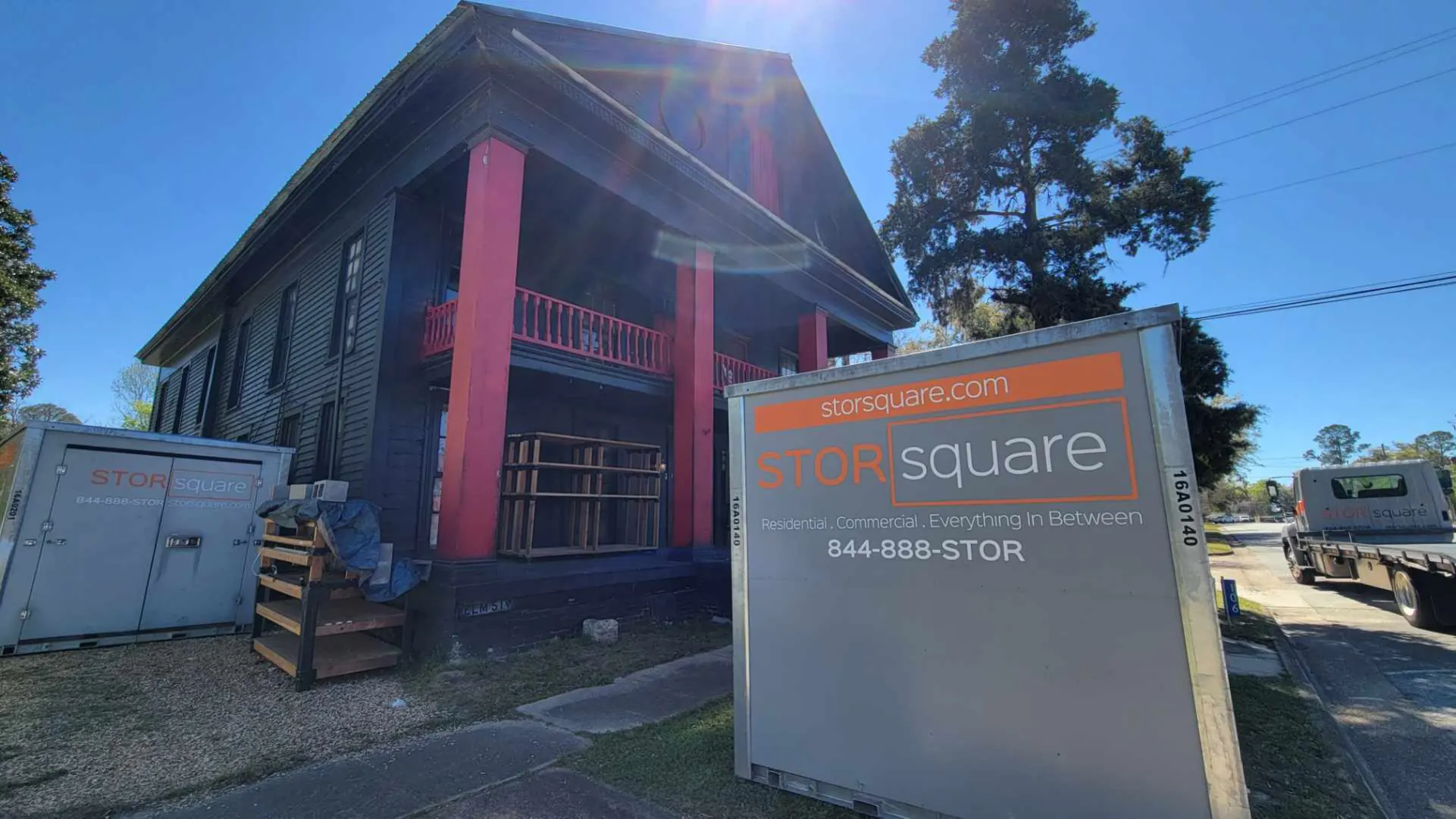 Mobile storage containers at a home renovation project protecting furniture during remodeling