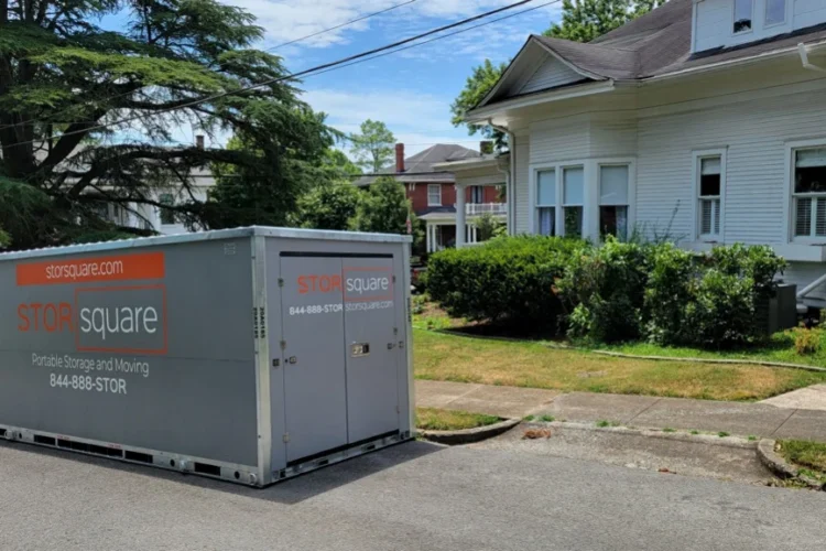 Portable storage container placed outside a home during a local move, helping keep belongings organized throughout the day.