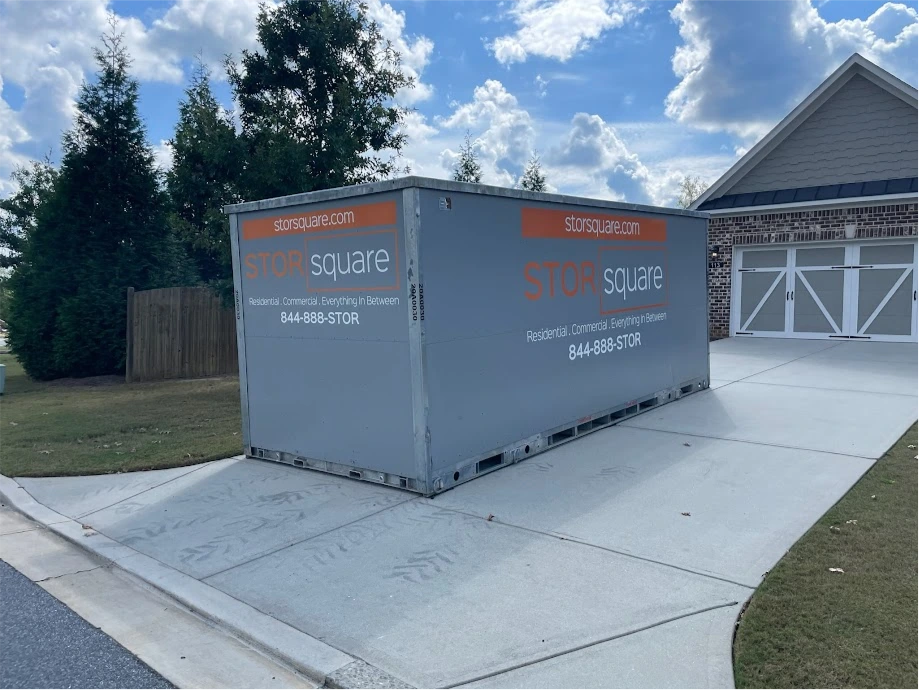 STORsquare portable storage container placed in a Plant City FL driveway in front of a residential home.