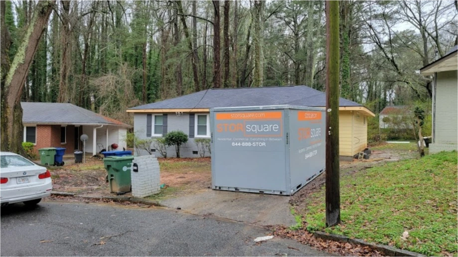 STORsquare storage container placed in a Mooresville NC neighborhood driveway beside a residential home and street.