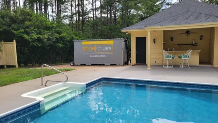 STORsquare storage container placed in a Statesville NC backyard near a pool and covered patio area.