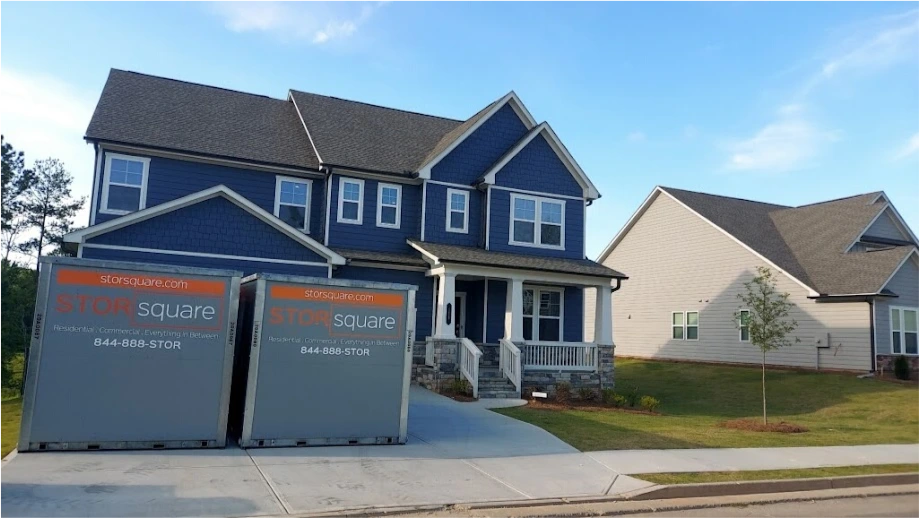 STORsquare storage containers placed in a Statesville NC residential driveway in front of a large home.