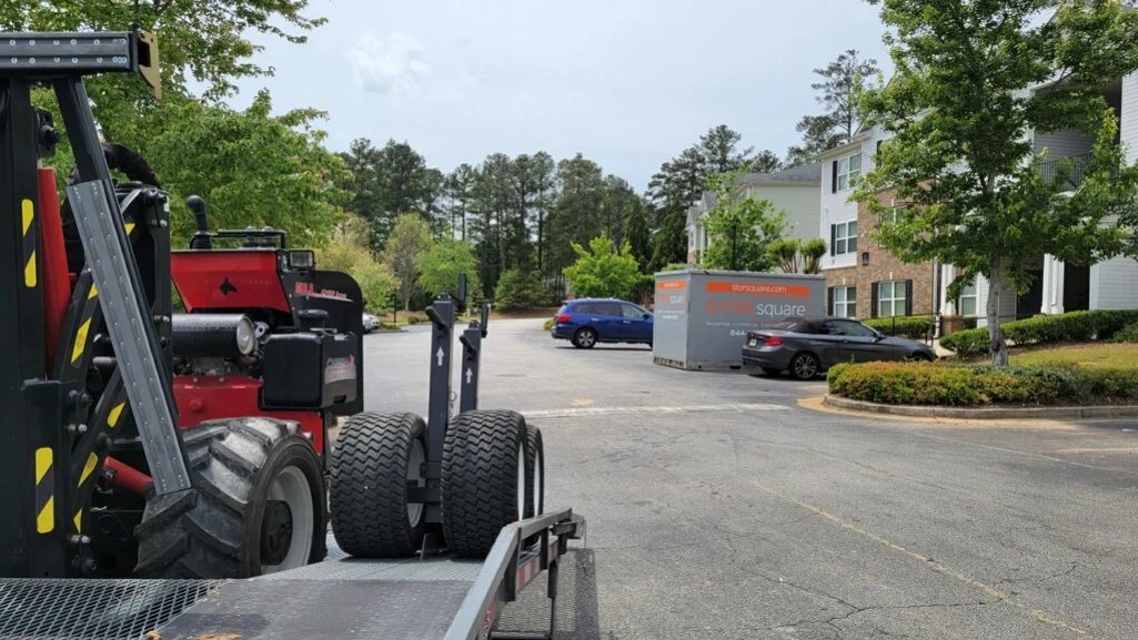 STORsquare equipment delivering a moving container to support long-distance storage and relocation needs