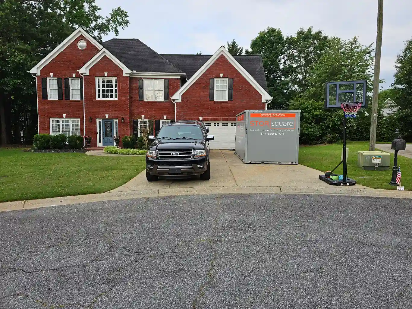Storage container at a residential home helping organize moving essentials and what to pack first