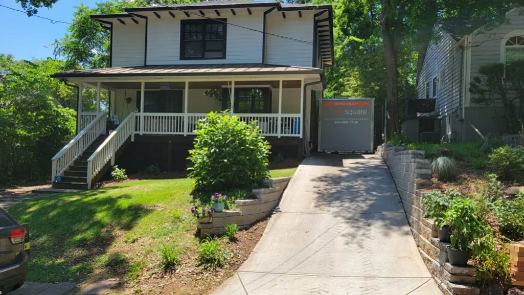 portable self storage unit placed in a residential driveway for extra home storage