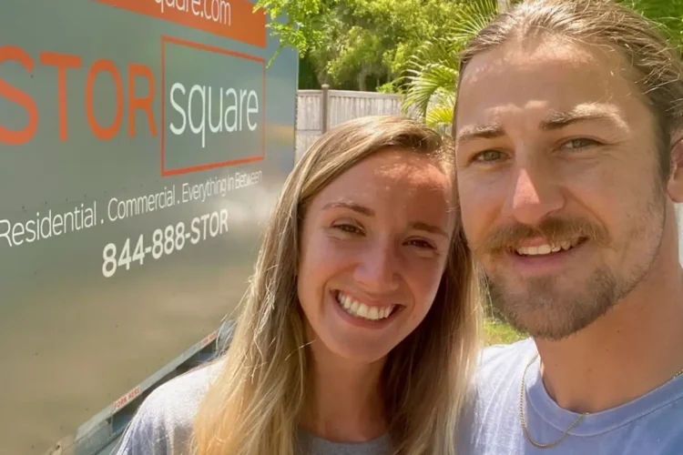 Couple using storage container rentals nearby to create space and organize their home more easily