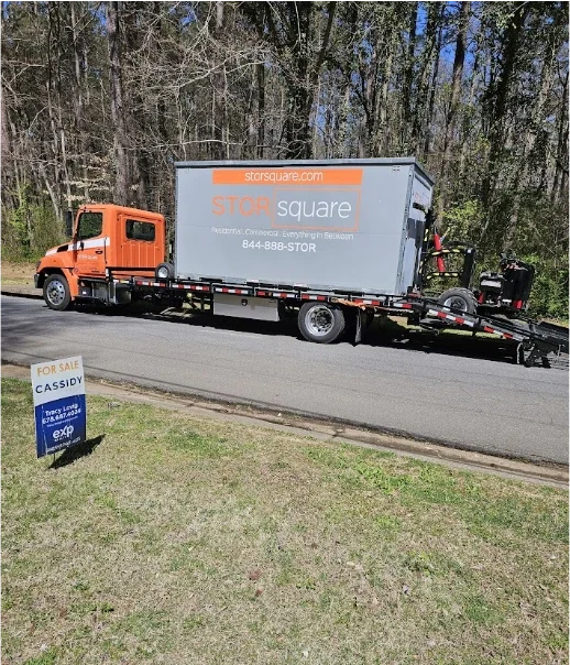 STORsquare long-distance moving container on a delivery truck in Georgia during residential street transport