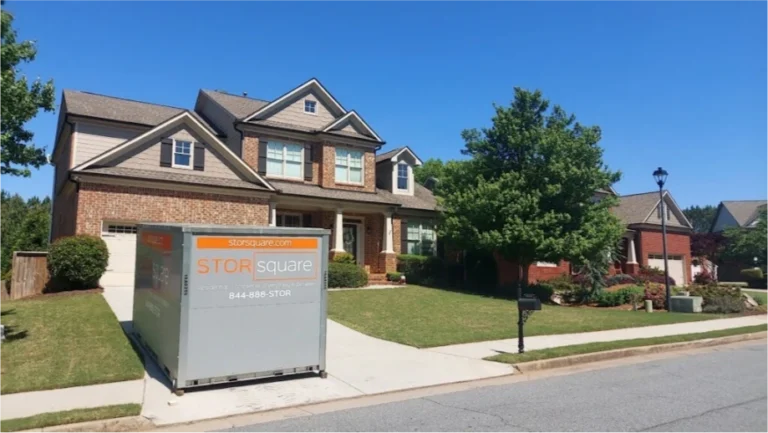 STORsquare mobile storage units placed in an Albemarle residential driveway in front of a two-story home