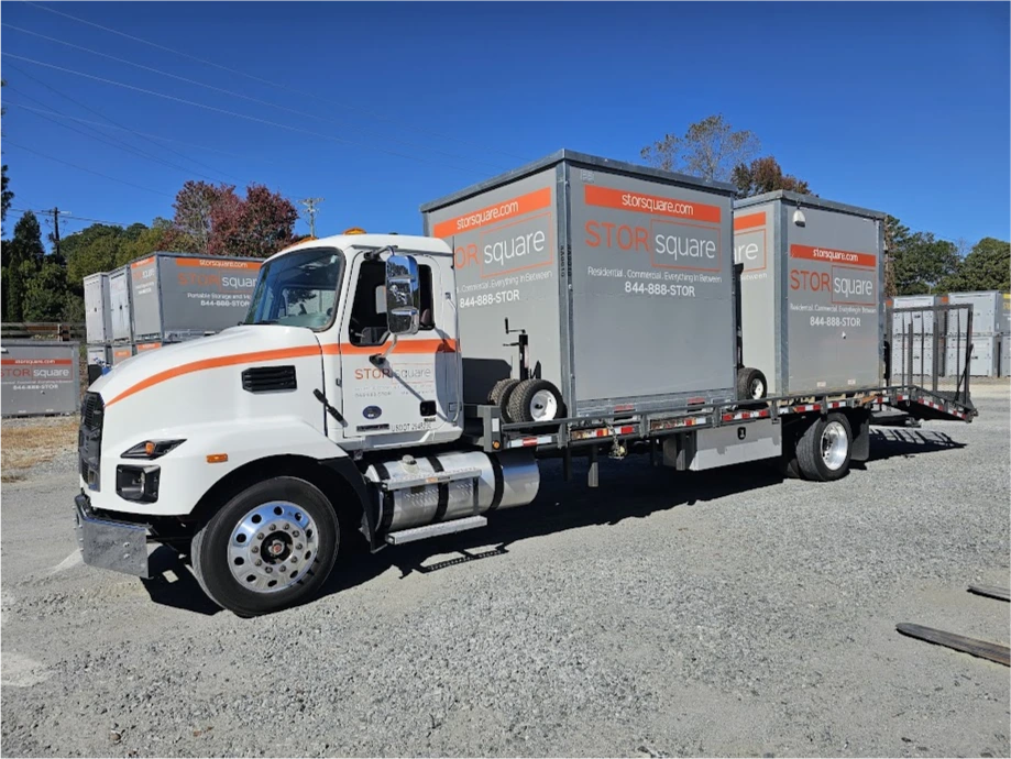 STORsquare portable storage units loaded on a delivery truck in Fort Mill with multiple containers ready for transport