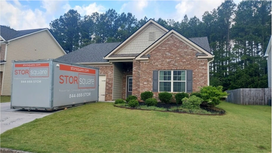 STORsquare portable storage units placed at an Albemarle home with driveway access and front yard space