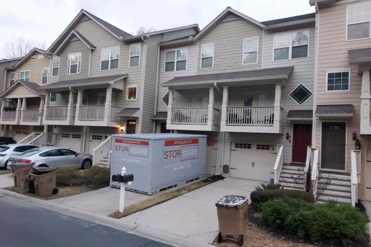 Long distance moving container delivered to a residential driveway before an interstate move