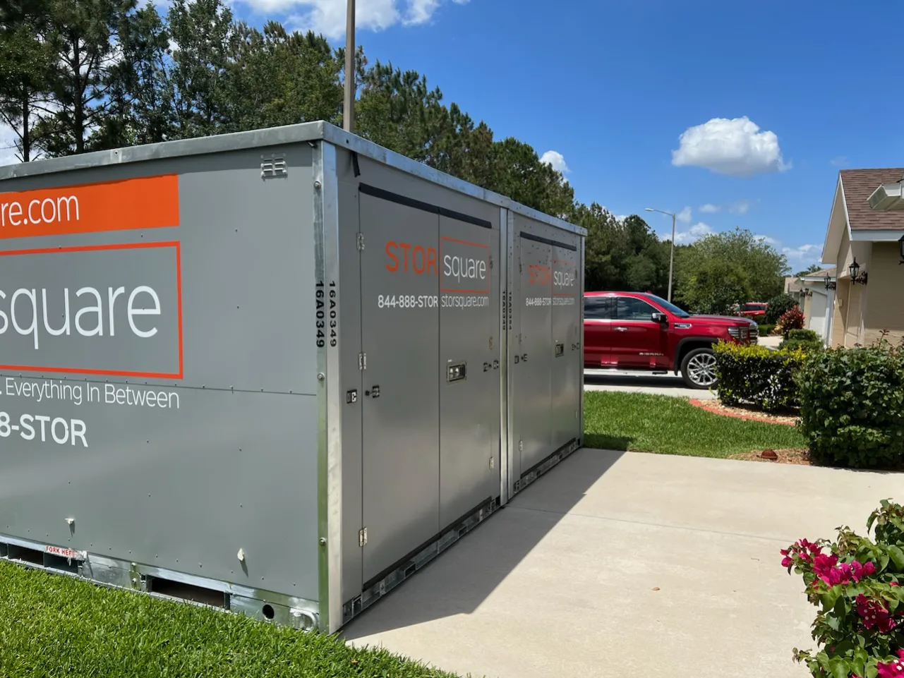 Mobile storage unit prepared for a long distance move in a residential neighborhood