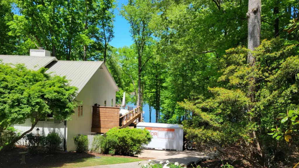 Mobile storage unit placed near a home during remodeling and moving preparation