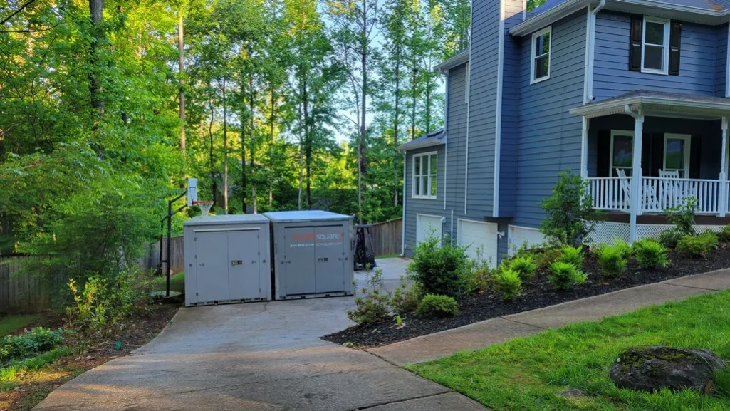 Mobile storage units create space for extra office supplies and furniture during home workspace setup