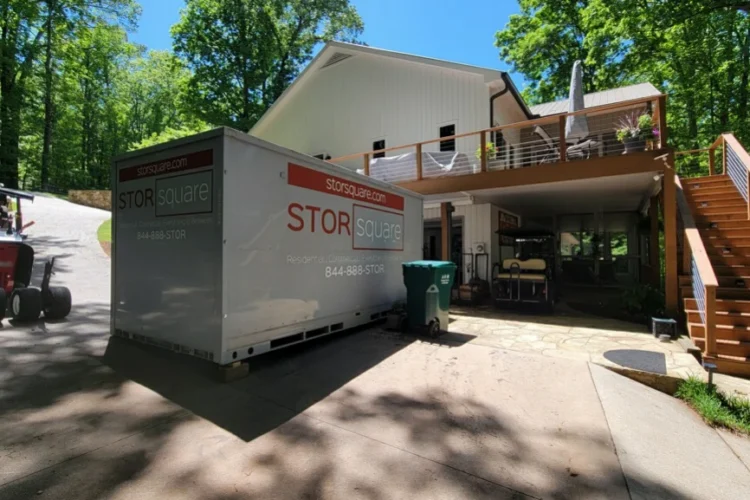 Mobile storage units create space outside a home during a home office reorganization project