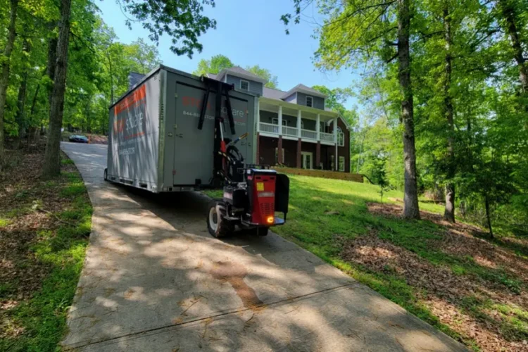 On-site storage containers for roofing delivered to a residential driveway for secure material and equipment storage