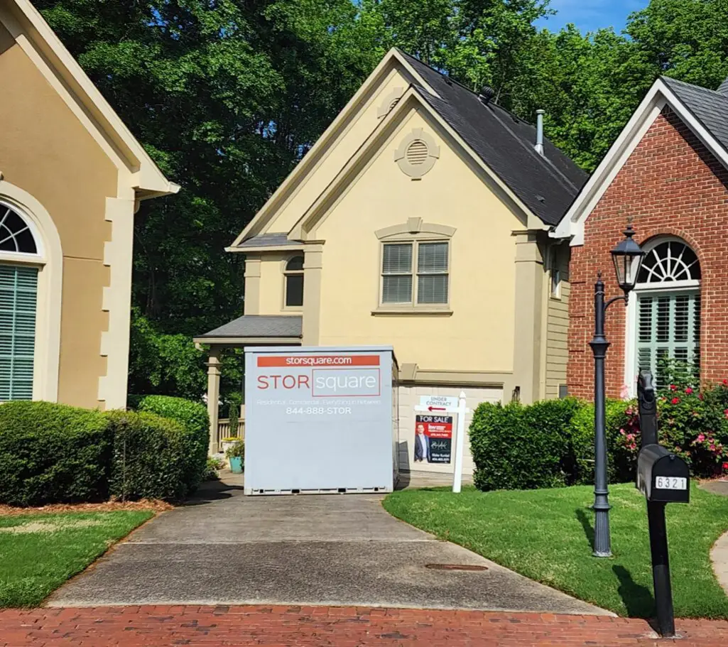 Portable storage unit in a driveway helping with home staging and storage before a move in Smyrna, Georgia