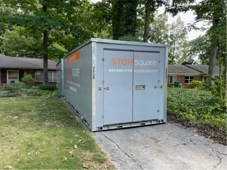 STORsquare storage container set along a wooded Johns Creek driveway for home moving or storage.