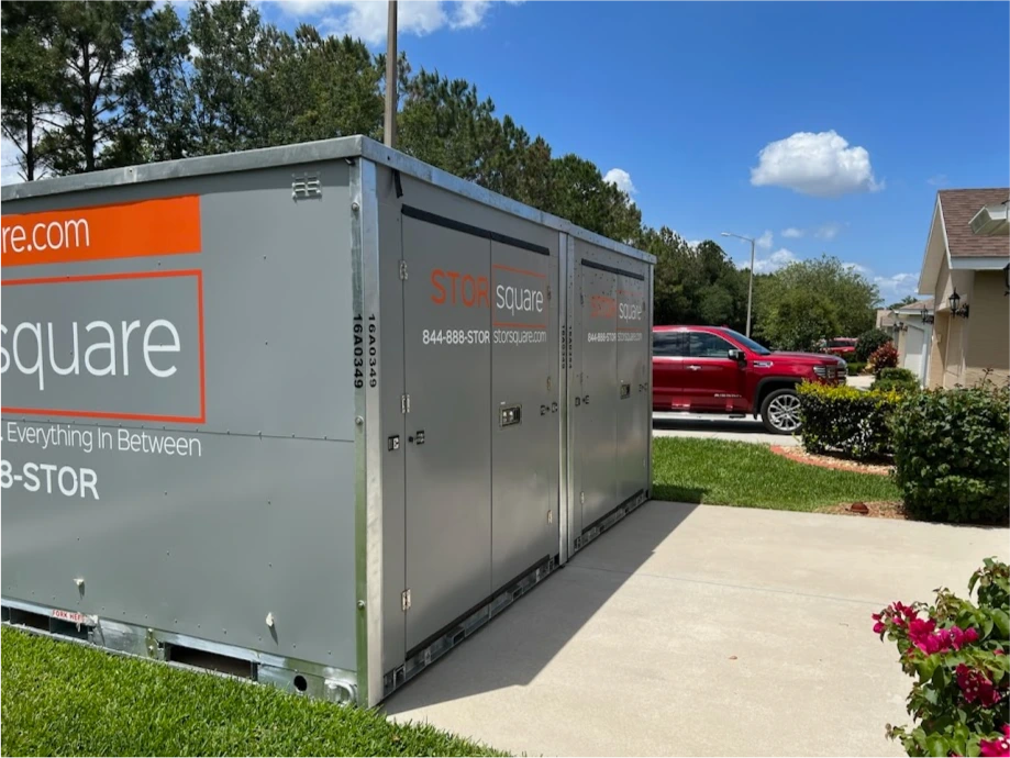 STORsquare portable storage units placed in a residential driveway for moving, remodeling, or temporary storage in Loganville, GA.