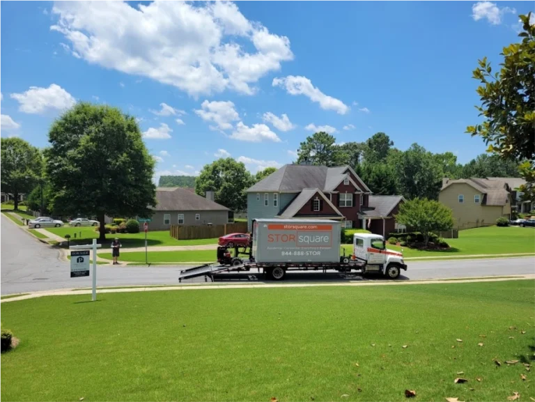 STORsquare truck delivering a portable moving container in a residential neighborhood for home moving and storage in Indian Trail, NC.