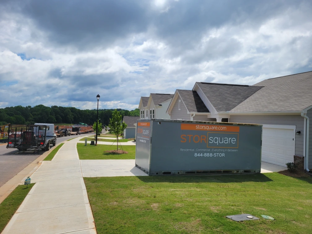STORsquare unit outside a home for long/distance moving with portable storage