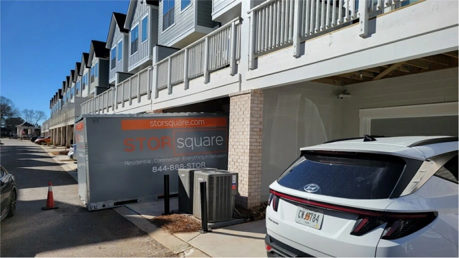 STORsquare portable storage container placed at a townhome community for moving, remodeling, or temporary storage in Harrisburg, NC.