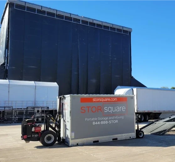 STORsquare commercial storage container beside a delivery truck and loading ramp in Midland, NC.