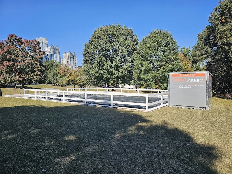 STORsquare portable storage container placed on grass at a Rockwood outdoor event site.