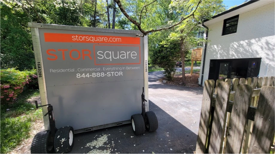 STORsquare portable storage unit placed in a tight residential driveway beside a home in Loughman.