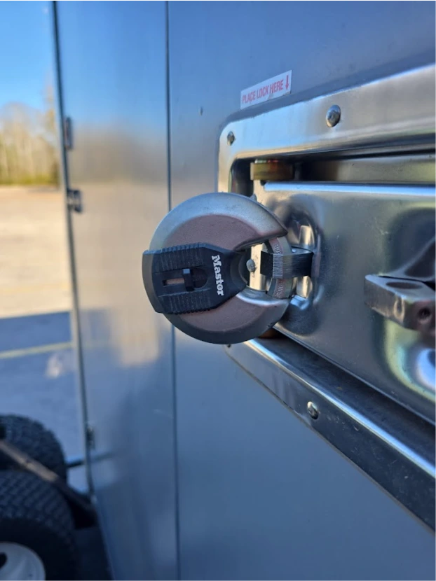 Close-up of a round lock secured to a STORsquare portable storage container in Commerce, GA.