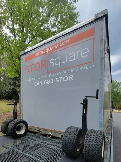 STORsquare storage container rental secured on a delivery trailer in Cornelius.