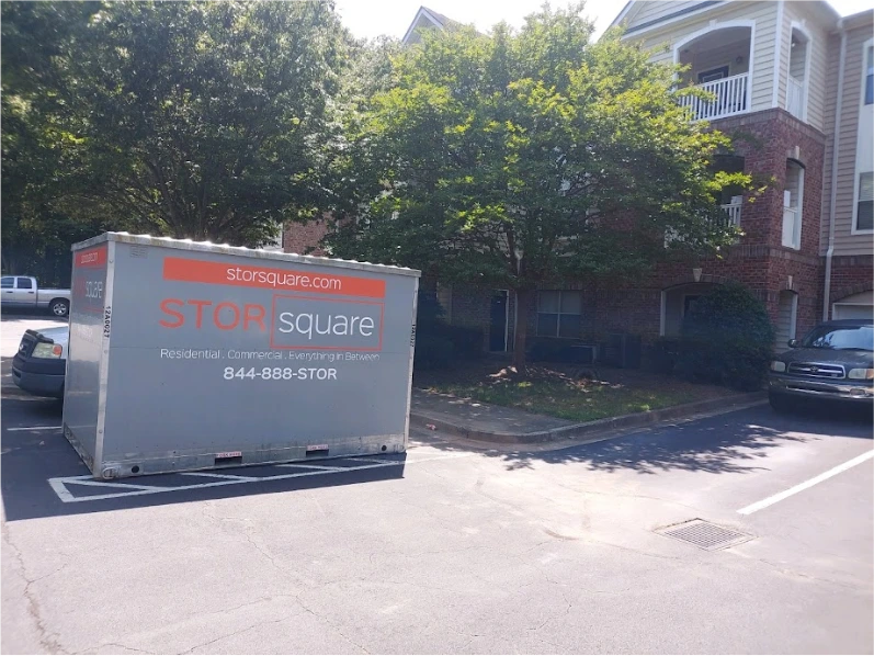 STORsquare storage container placed in a Rockwood apartment parking lot near a brick building.