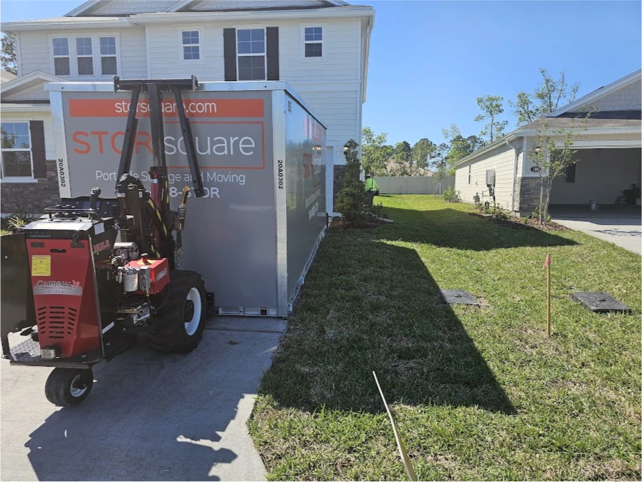 STORsquare mobile storage unit positioned on a residential driveway for customers in East Spencer, NC.